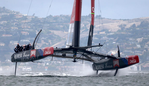 catamaran aquaplaning across the water