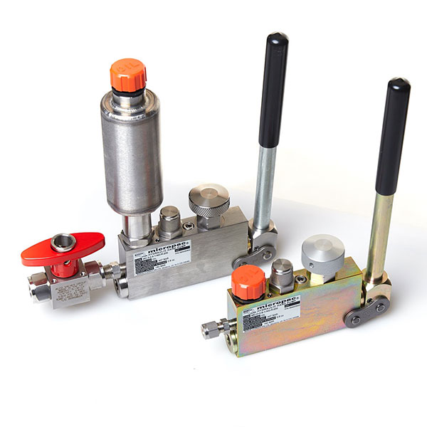a pair of Micropac MC compact hydraulic pumps side by side
