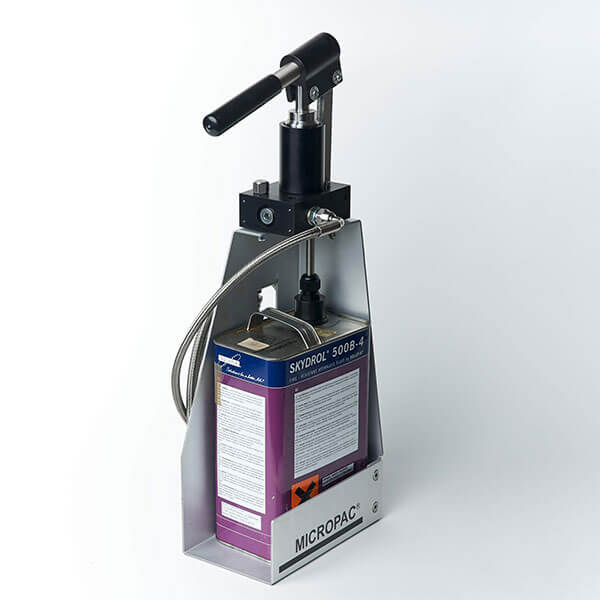 skydrol dispensing pump and tin in a carry around package