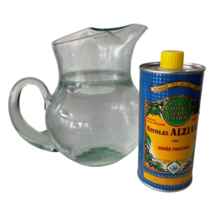 PhotoRoom-20220930_132054 800×800 a jug of water next to a tin of vegetable oil