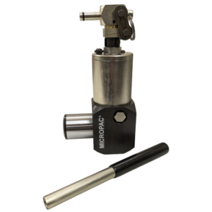hydraulic jack with integral reservoir and handle