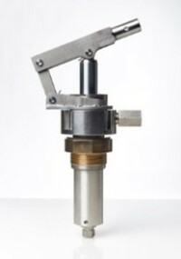 A Micropac high displacement drum pump for shifting a lot of fluid. A stainless steel round body with a cylindrical barrel below it and a handle mechanism above.