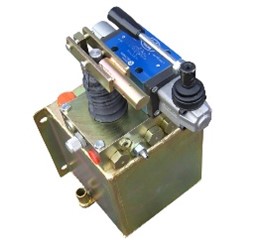 a pump unit with a pump manifold on top, a fixed cube hydraulic reservoir and a valve with a lever alongside